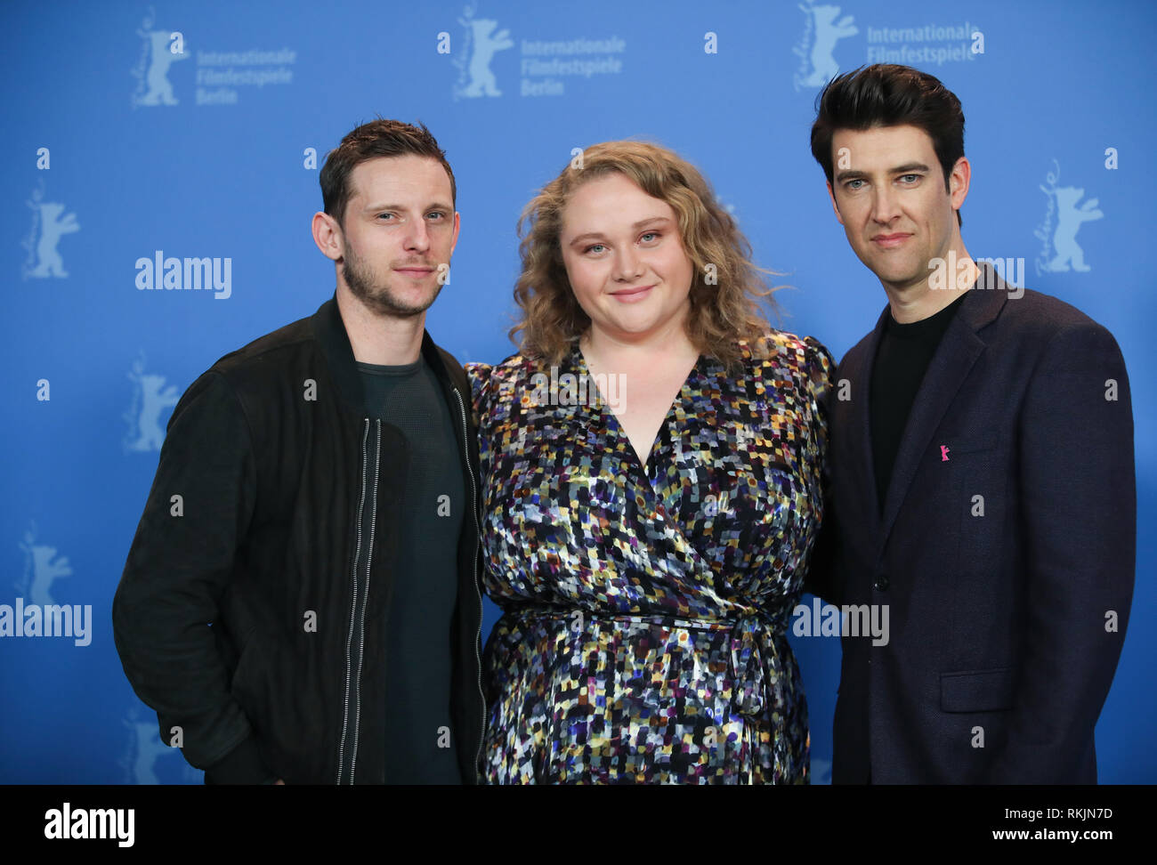 Berlin, Germany. 11th Feb, 2019. 69th Berlinale, Photocall 'Skin', USA, Panorama: Jamie Bell (l), British actor stands next to Danielle Macdonald, actress, and Guy Nattiv, director and screenwriter. Credit: Christof Soeder/dpa/Alamy Live News Stock Photo