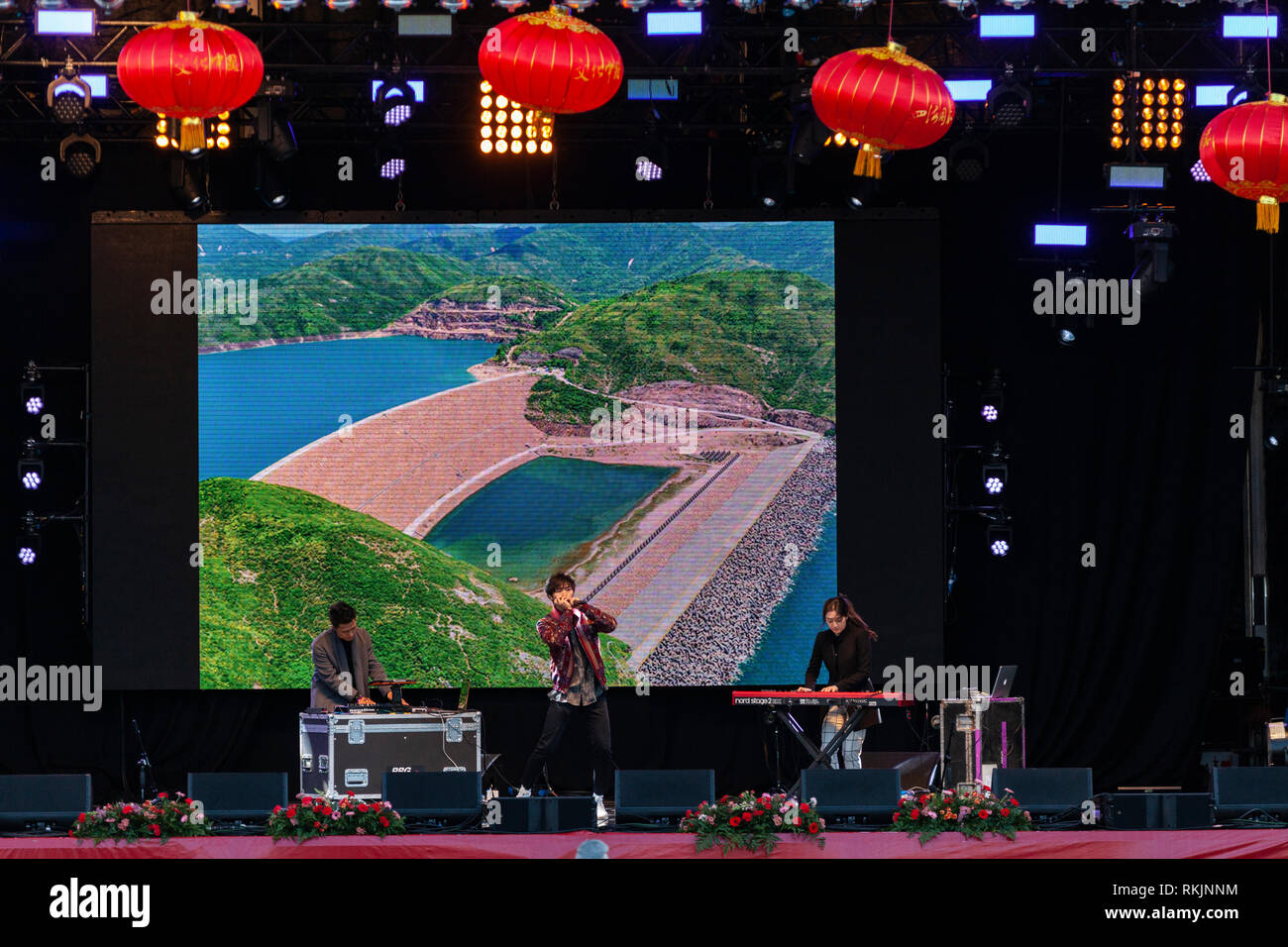 London, UK, 10 February, 2019. Chinese New year celebration at Trafalgar square , London, UK. Group perfromance by Chinese young men on stage. Credit: Harishkumar Shah/Alamy Live News Stock Photo