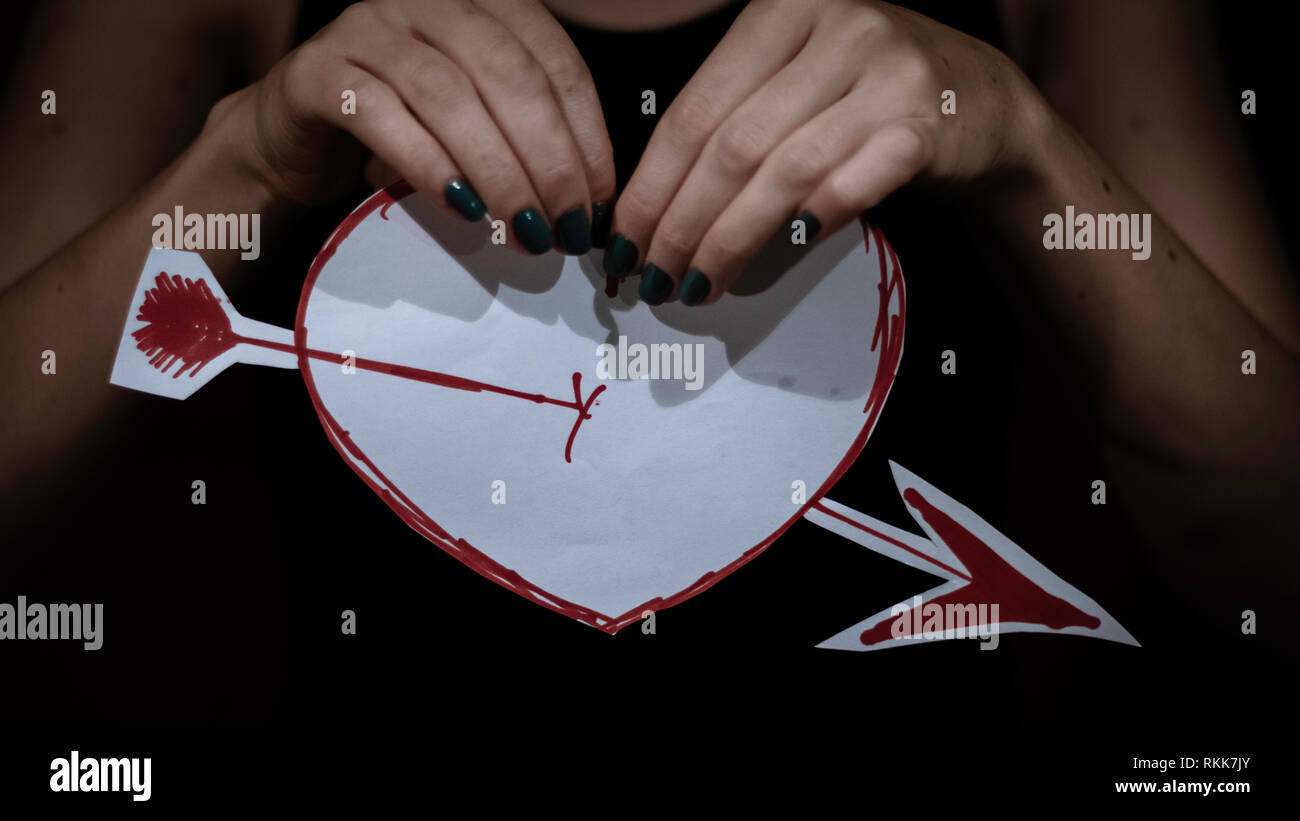 Lady Hoolding Dawen Heart With Red Marken On White Paper And Cuted She Prapered To Broke It Apart Stock Photo Alamy Lady Hoolding Dawen Heart With Red Marken On White Paper And Cuted She Prapered To Broke It Apart Stock Photo Alamy