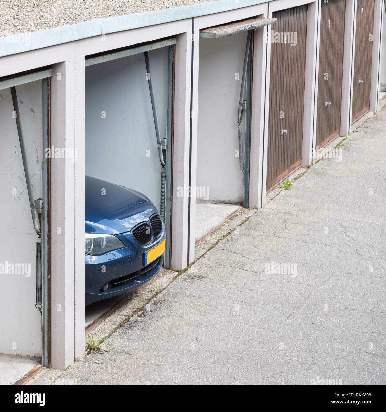 Unrecognisable Modern Car In An Old Garage The Car Is To Big For