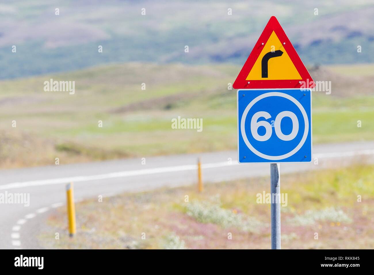 Curve with advisory speed limit in Iceland. Stock Photo