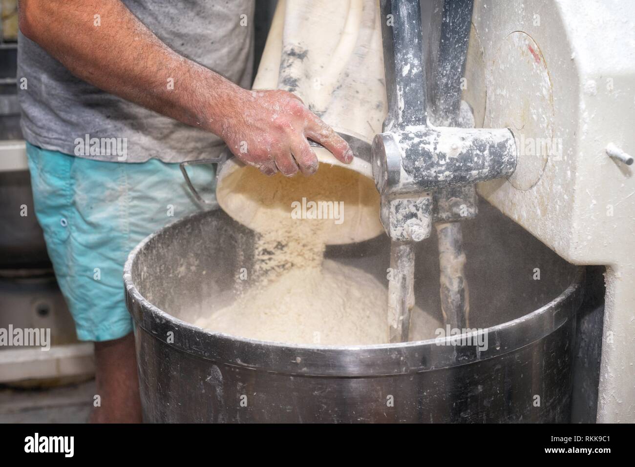 Bread Mixer In Bakery, mixing dough for baguettes in a bakery machine for  mixing dough Stock Photo - Alamy