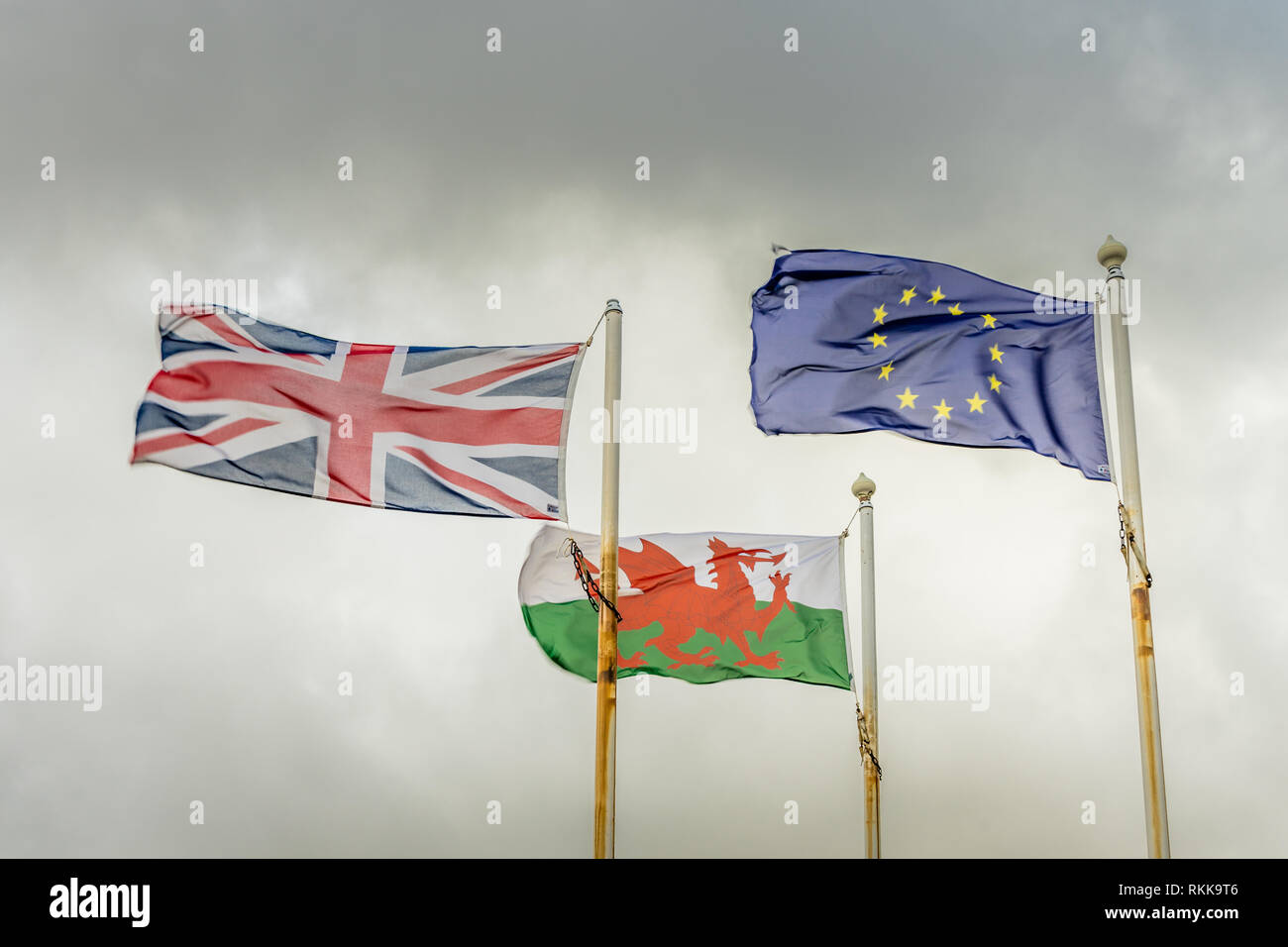 The Red Dragon flag of Wales, the European Union (EU)  Flag and the Union Jack (UK flag) Stock Photo
