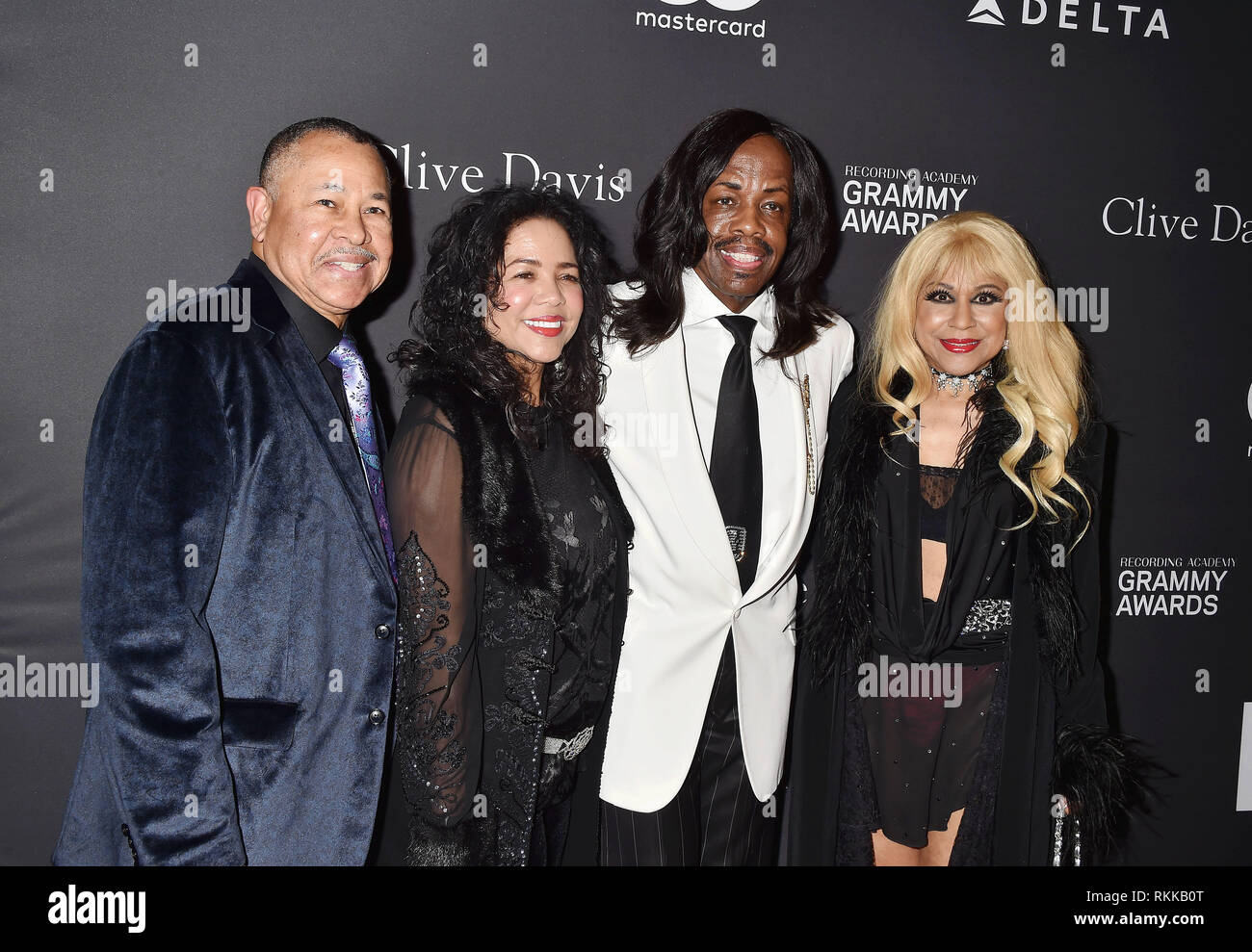 BEVERLY HILLS, CA - FEBRUARY 09: Ralph Johnson (L) and Verdine White (2nd R) of Earth, Wind & Fire and guests attend The Recording Academy And Clive D Stock Photo