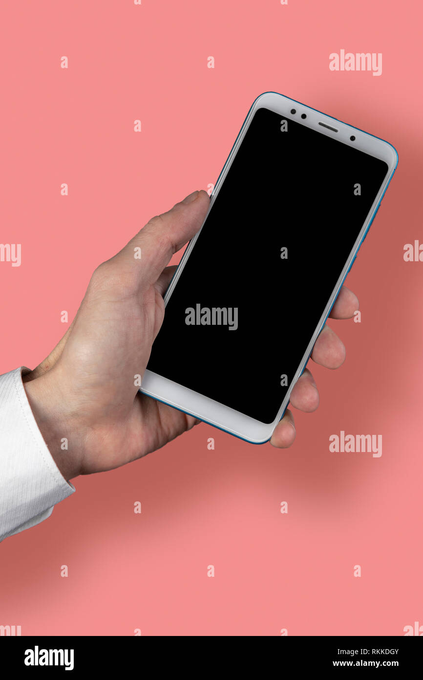 Man's hand holding black screen mobile phone Stock Photo Alamy