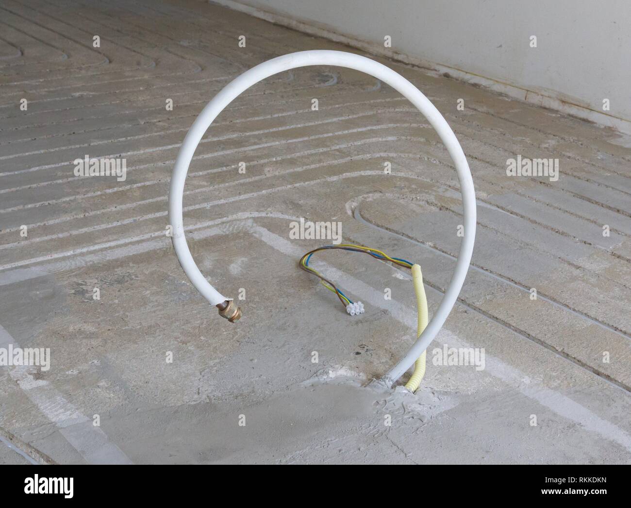 New electricity and gas pipe in a concrete floor Building a kitchen