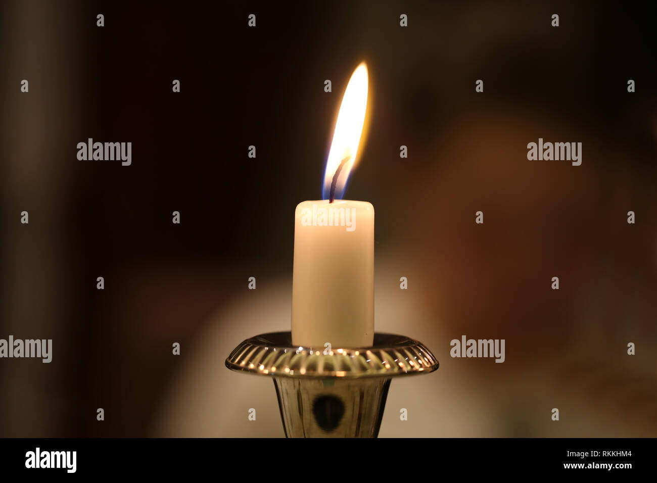 Burning candles / Burning candles on a blurred background Stock Photo