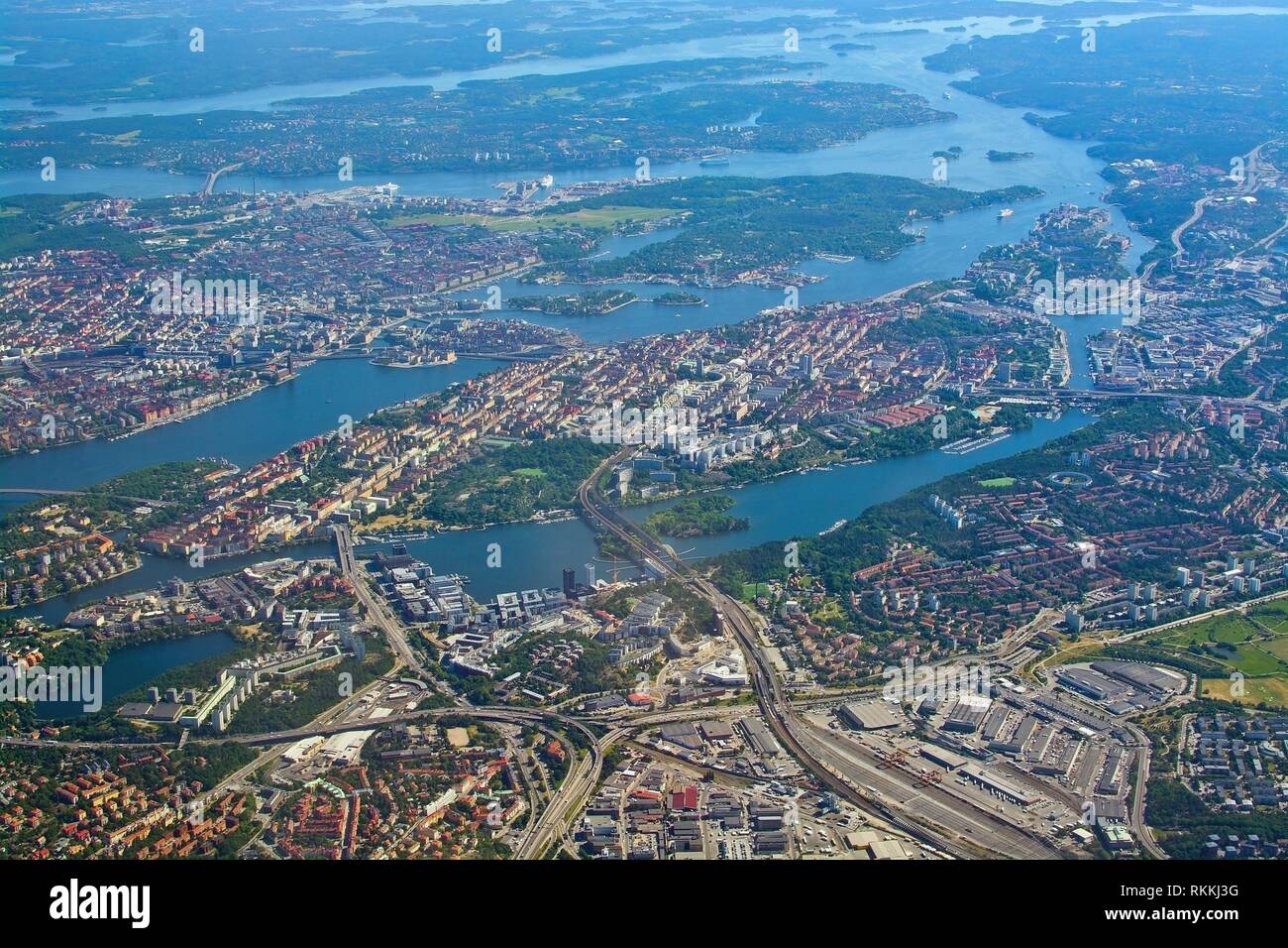 Aerial shot over Stockholm, Sodermalm, Old Town island and Djurgarden, during inflight to Arlanda airport on a sunny day in June in Stockholm, Sweden. Stock Photo