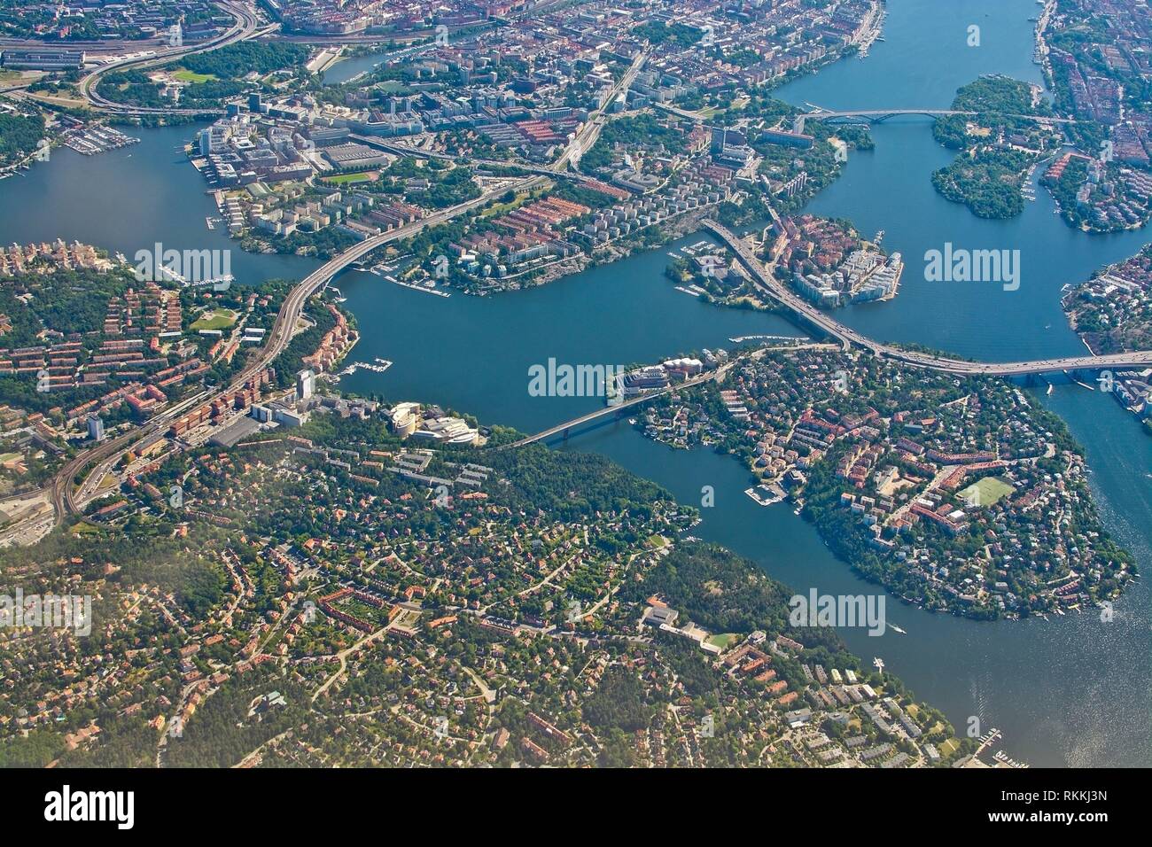 Aerial shot over Stockholm, Essingeleden and Traneberg bridge to Bromma