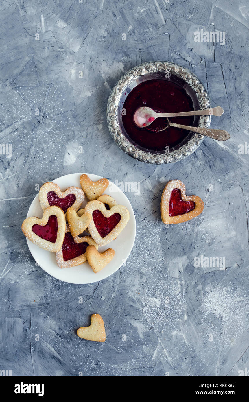 Heart shaped Linzer cookies with jam for Valentine's day. Delicious