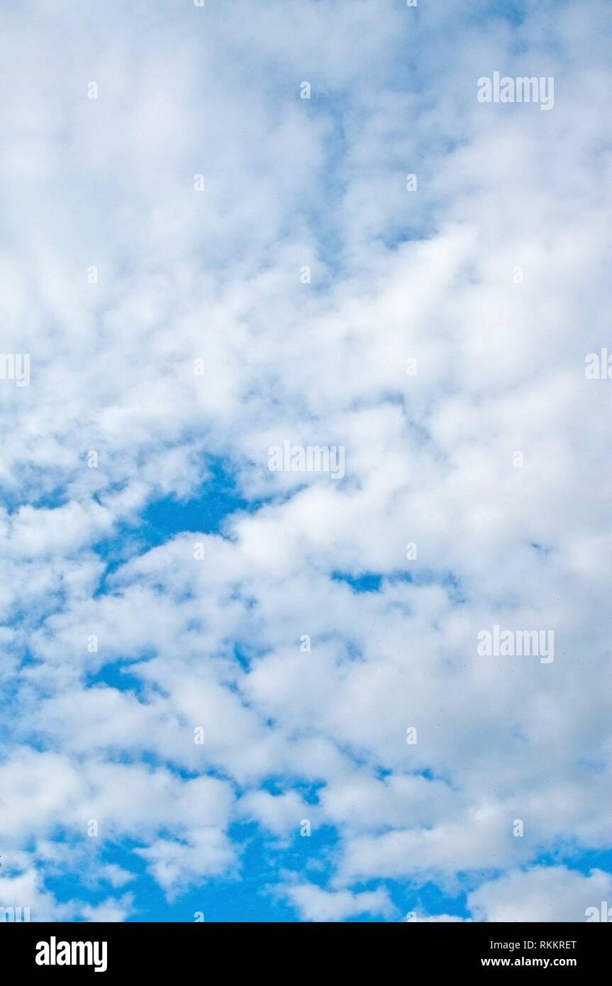 Blue summer sky with partial cloud cover in Sweden. Stock Photo