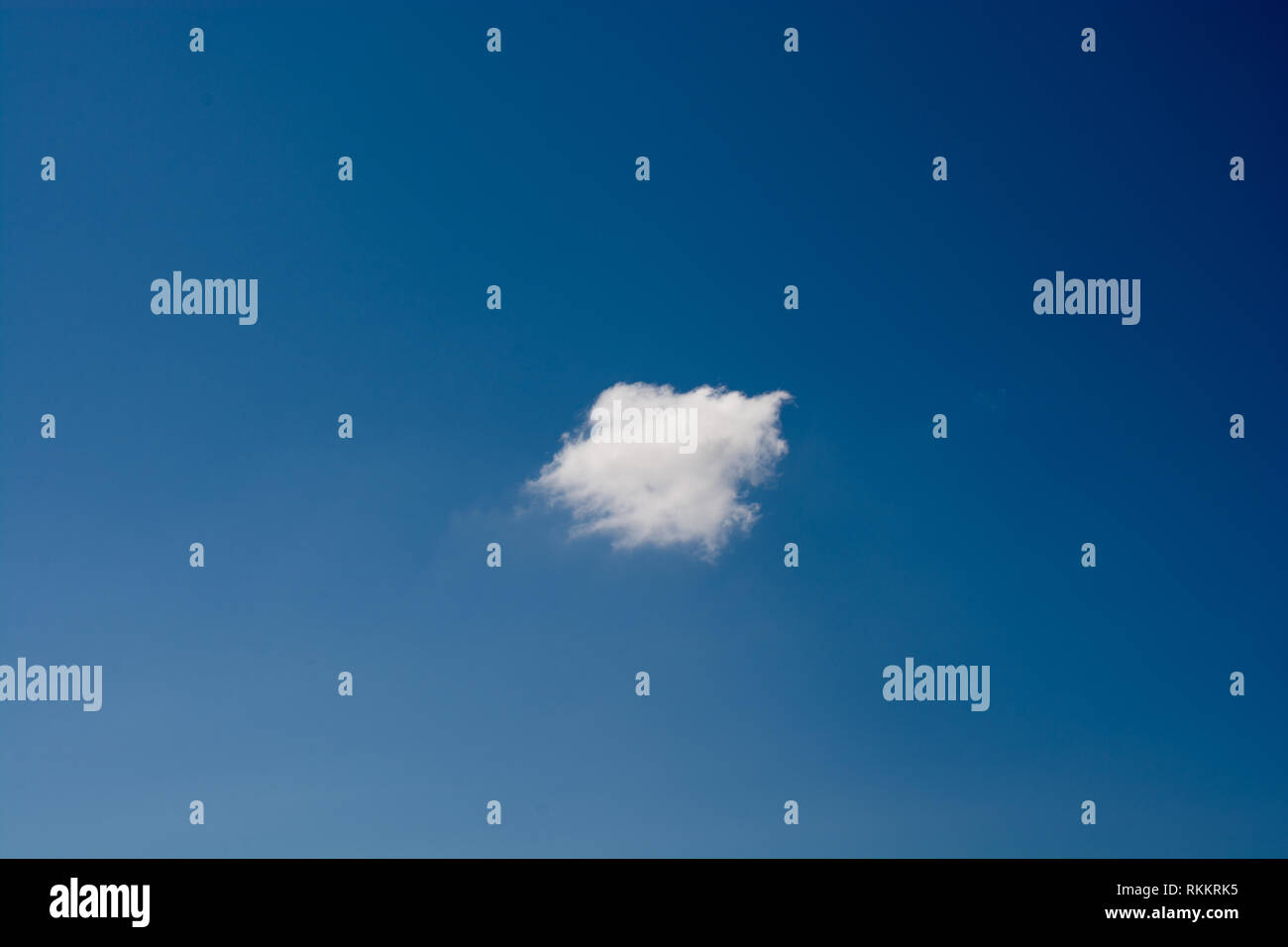 Blue cloudy sky with white and grey clouds Stock Photo - Alamy