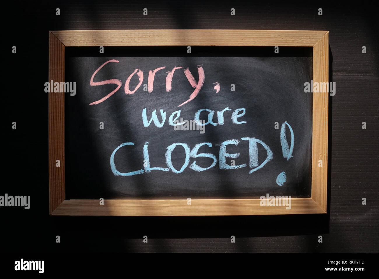Sorry we are closed written on a board as a notice Stock Photo