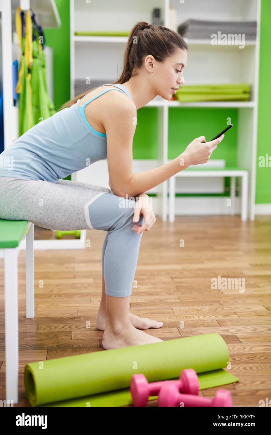 Woman Using Smartphone in Smartphone Stock Photo