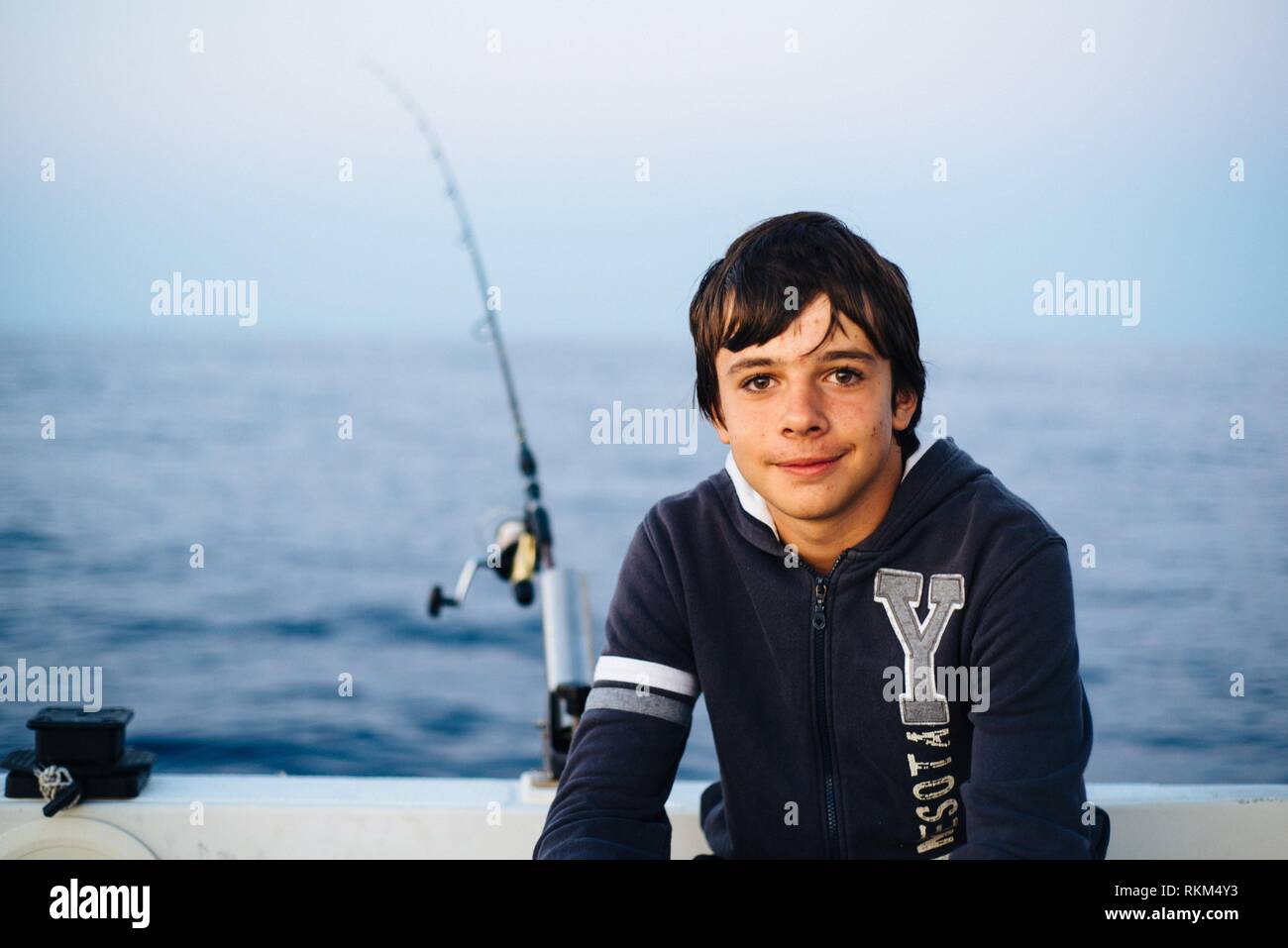 Happy boy and boat hi-res stock photography and images - Alamy