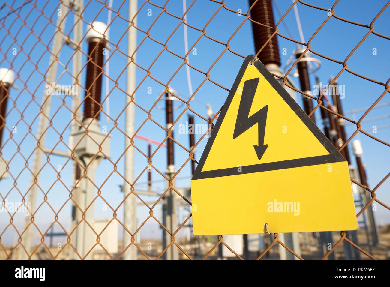 electrical hazard sign placed on a metal fence Stock Photo Alamy