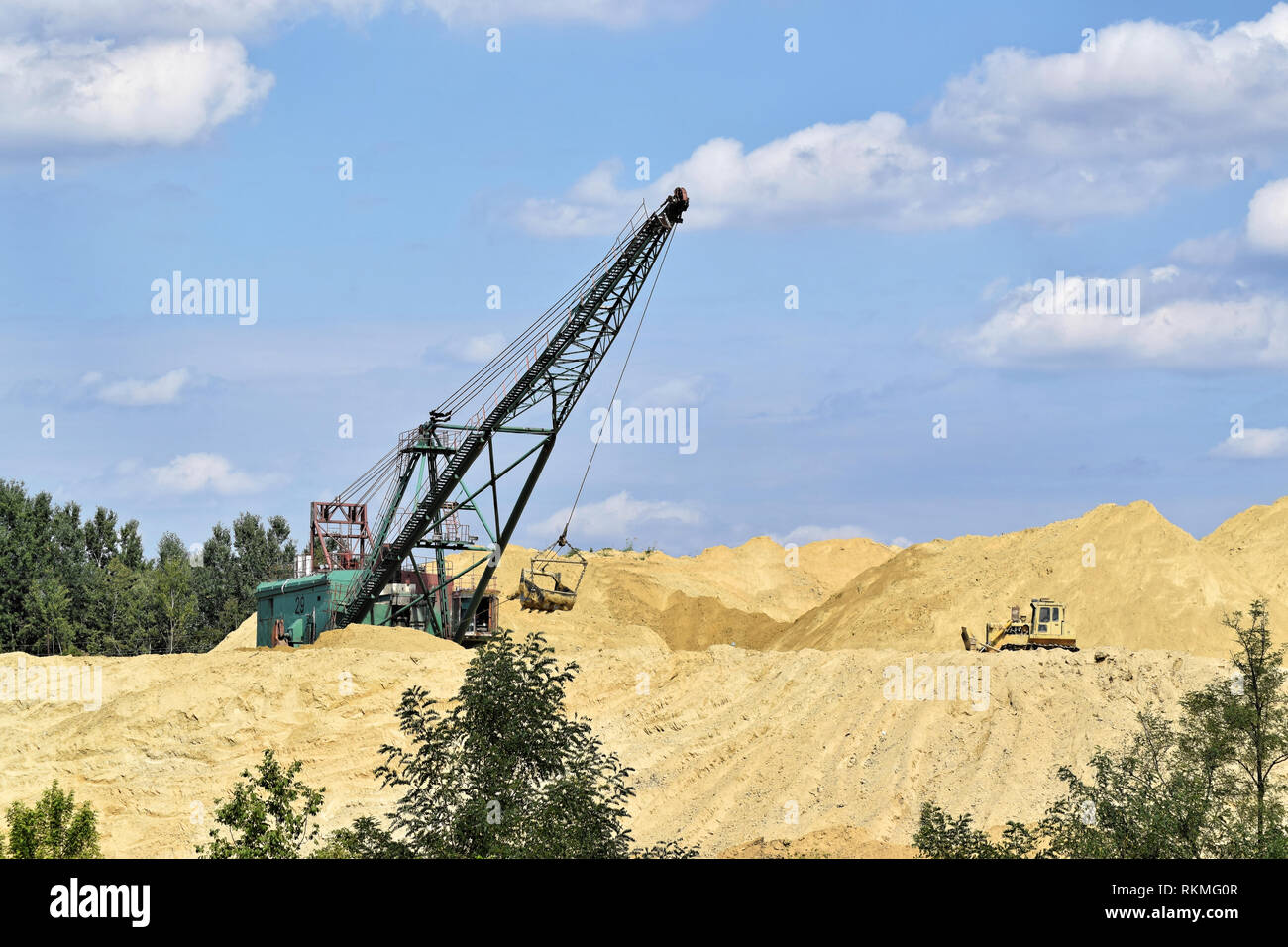 Bagger operation in a small surface mine Stock Photo