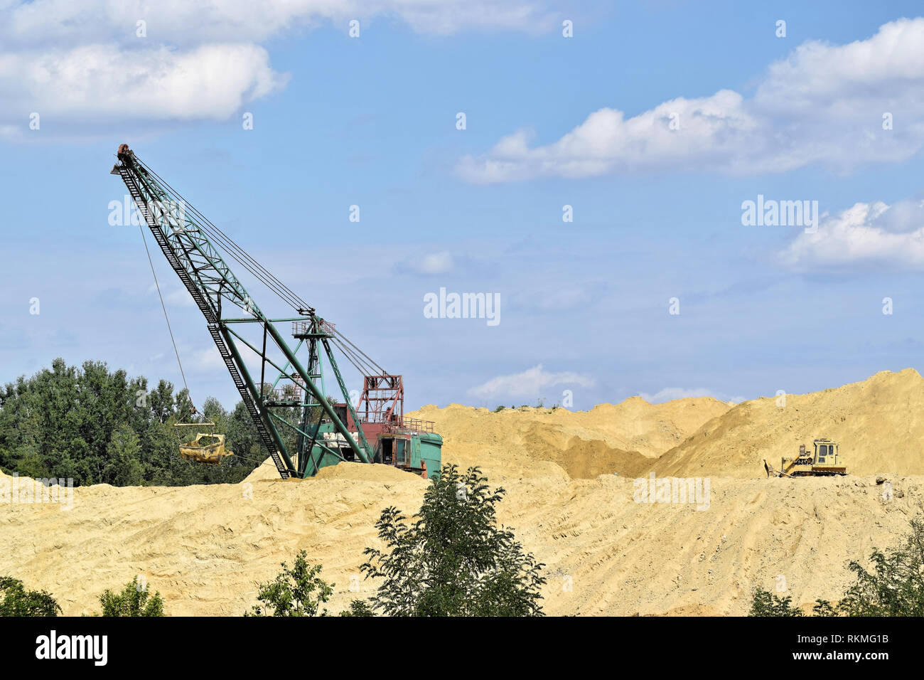 Bagger operation in a small surface mine Stock Photo