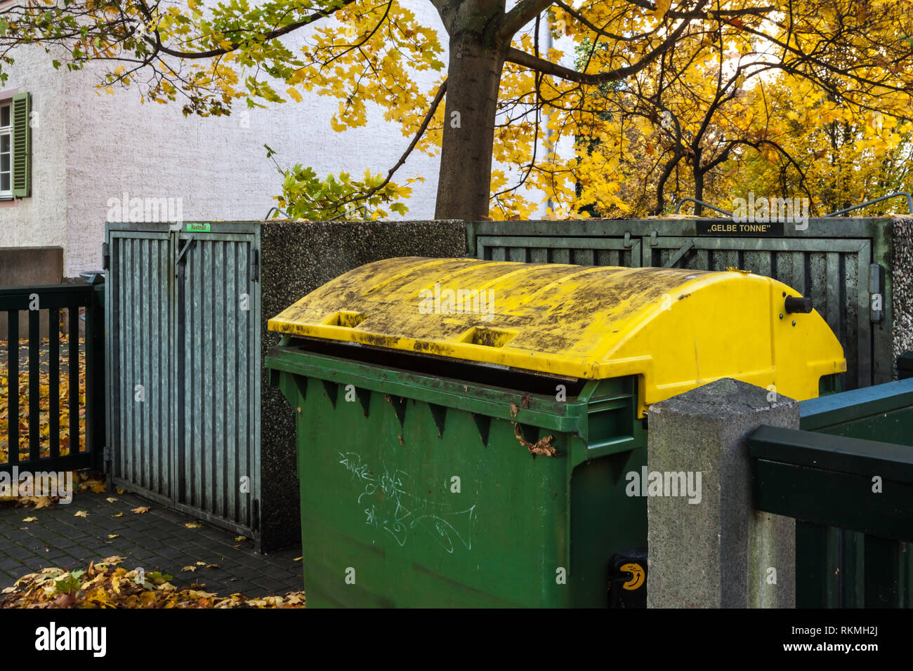 Yellow wheelie bins hi-res stock photography and images - Alamy