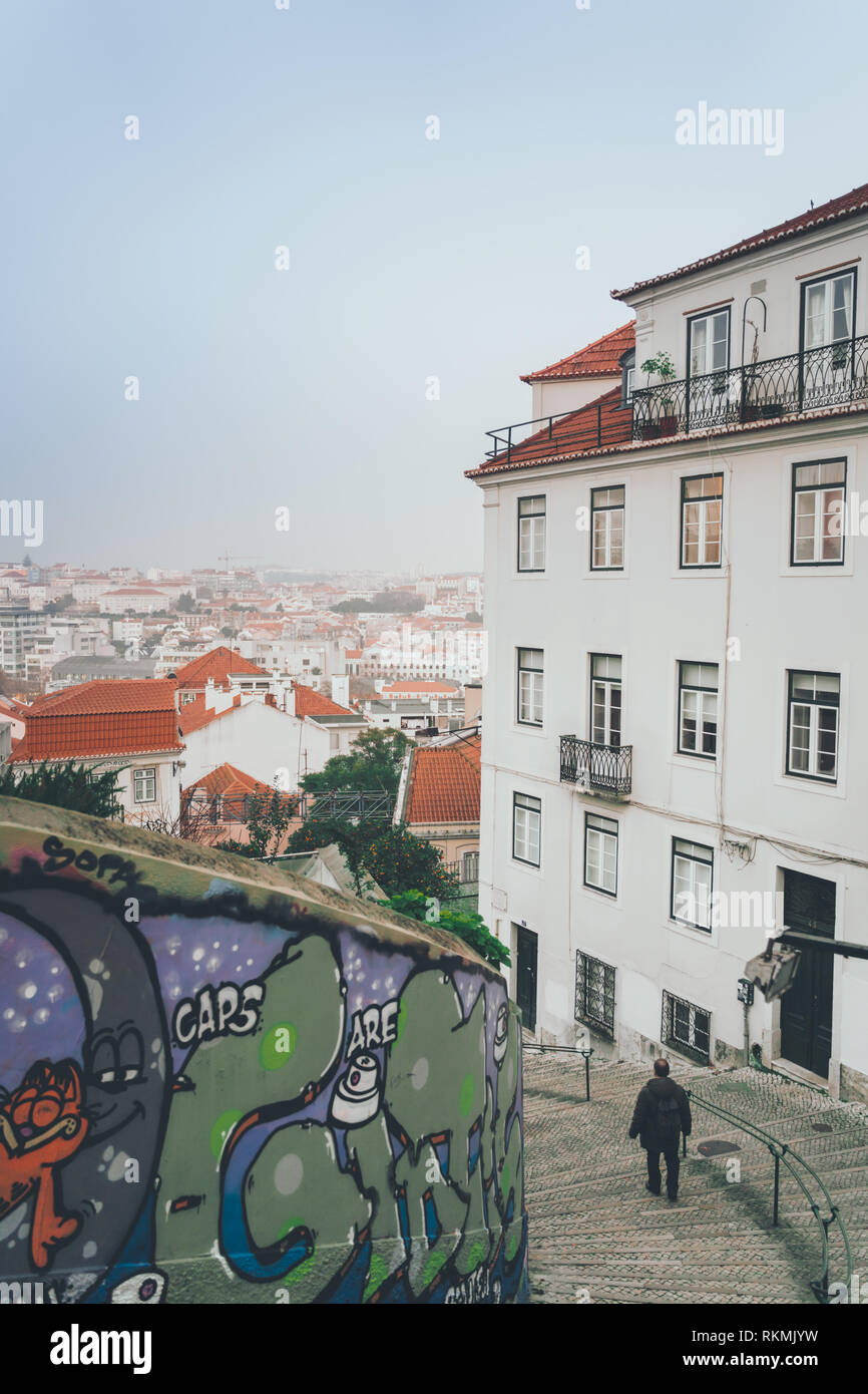 Lisbon, Portugal - 01/03/19: Spiral street staircase downtown with a great view cityscape of lisbon. Principe real, miradouro, viewpoint or belvedere Stock Photo