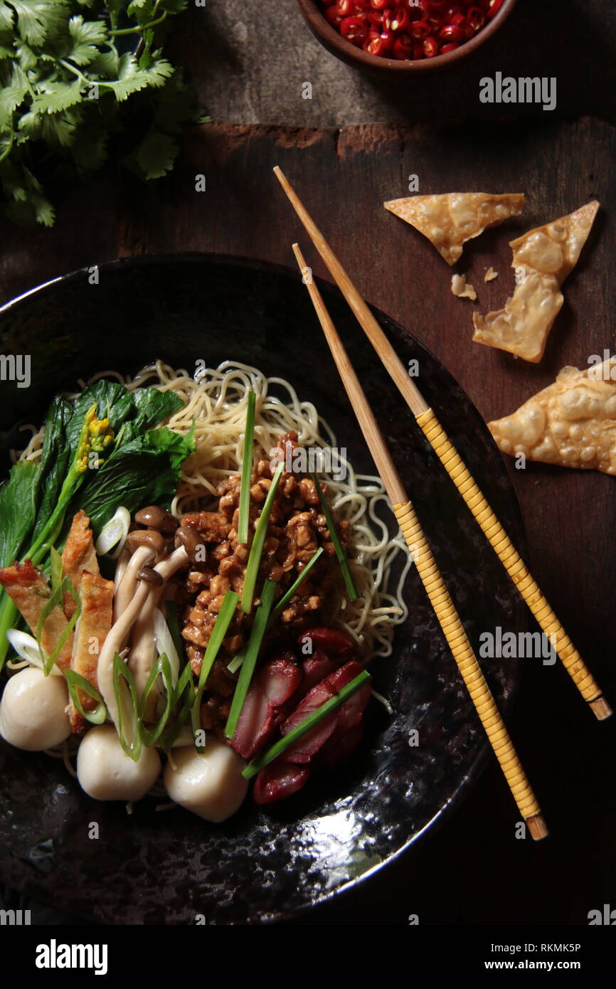 Chinese Noodle Soup with Barbecue Pork, Soy Chicken, Fish Balls, and
