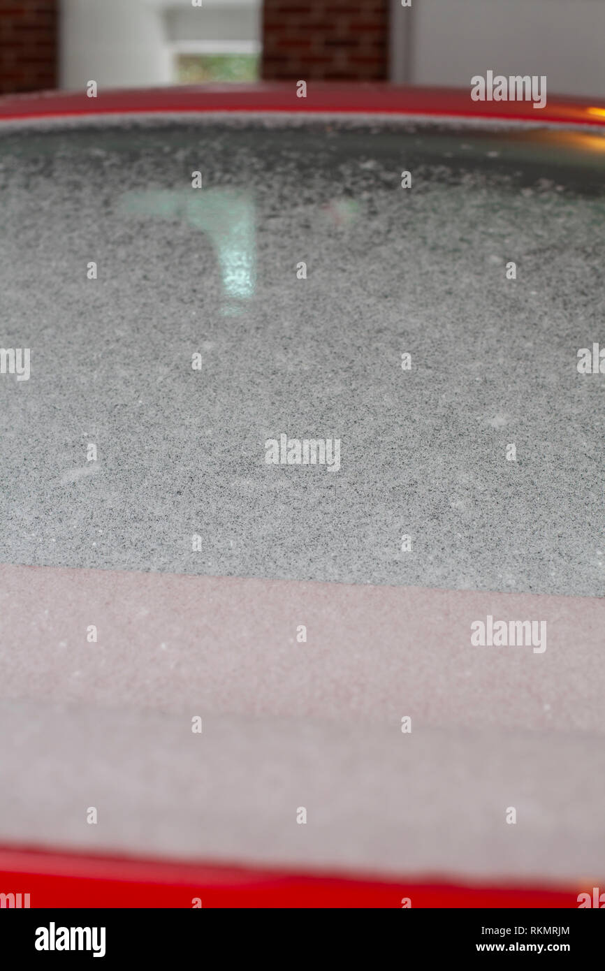 Snow and ice covering the back windshield of a vehicle Stock Photo Alamy