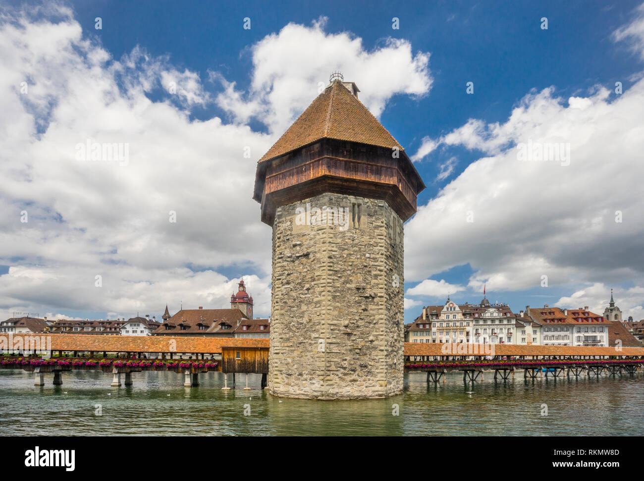 the wooden medieval Kapellbrücke (Chapel Bridge) with its iconic octagonal stone tower, Wasserturm, meaning tower in the water, Lucerne, Canton Lucern Stock Photo