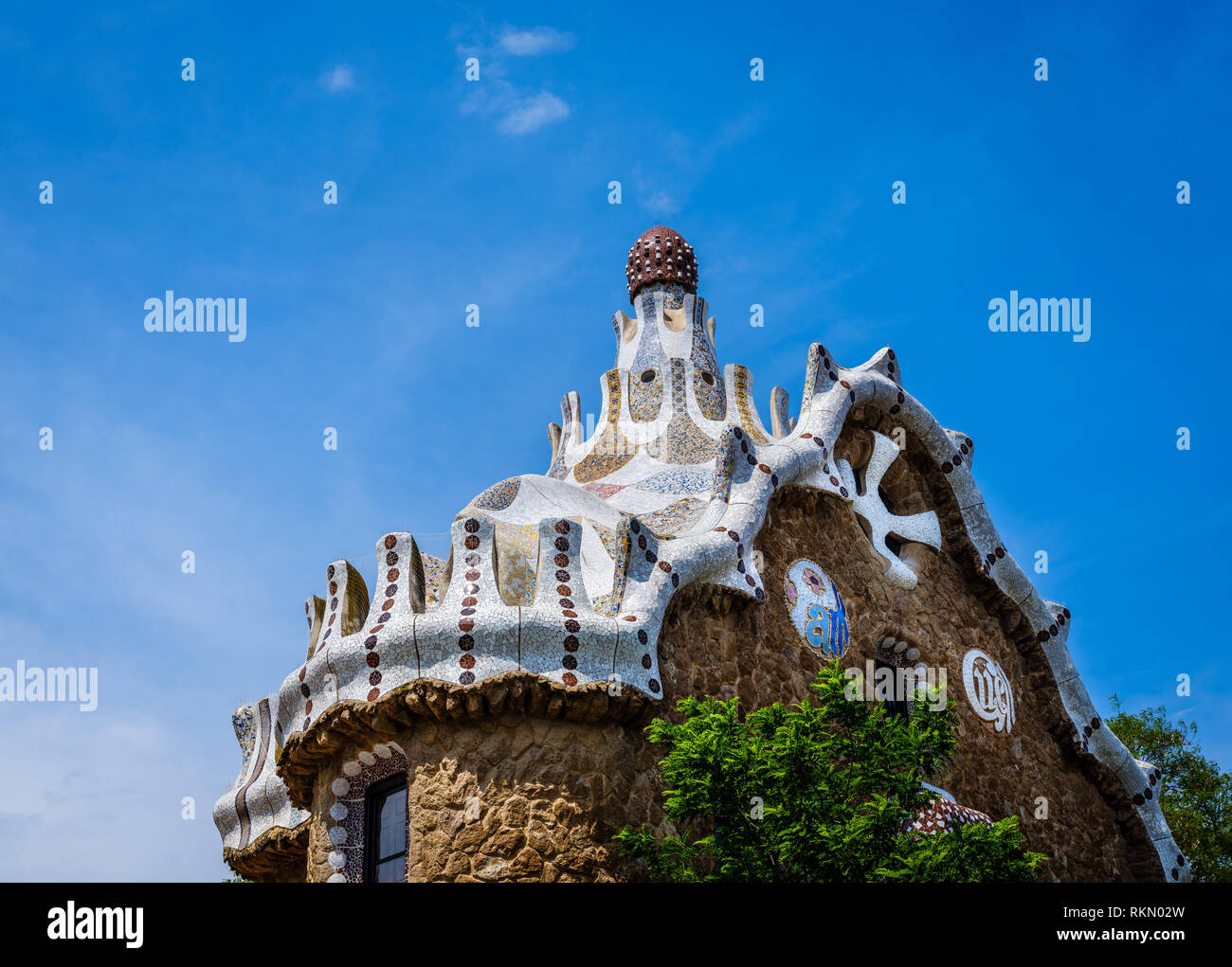 BARCELONA, SPAIN - CIRCA MAY 2018: Entrance pavilion of Parc Güel. Parque Güell is a public park system composed of gardens and architectonic elements Stock Photo