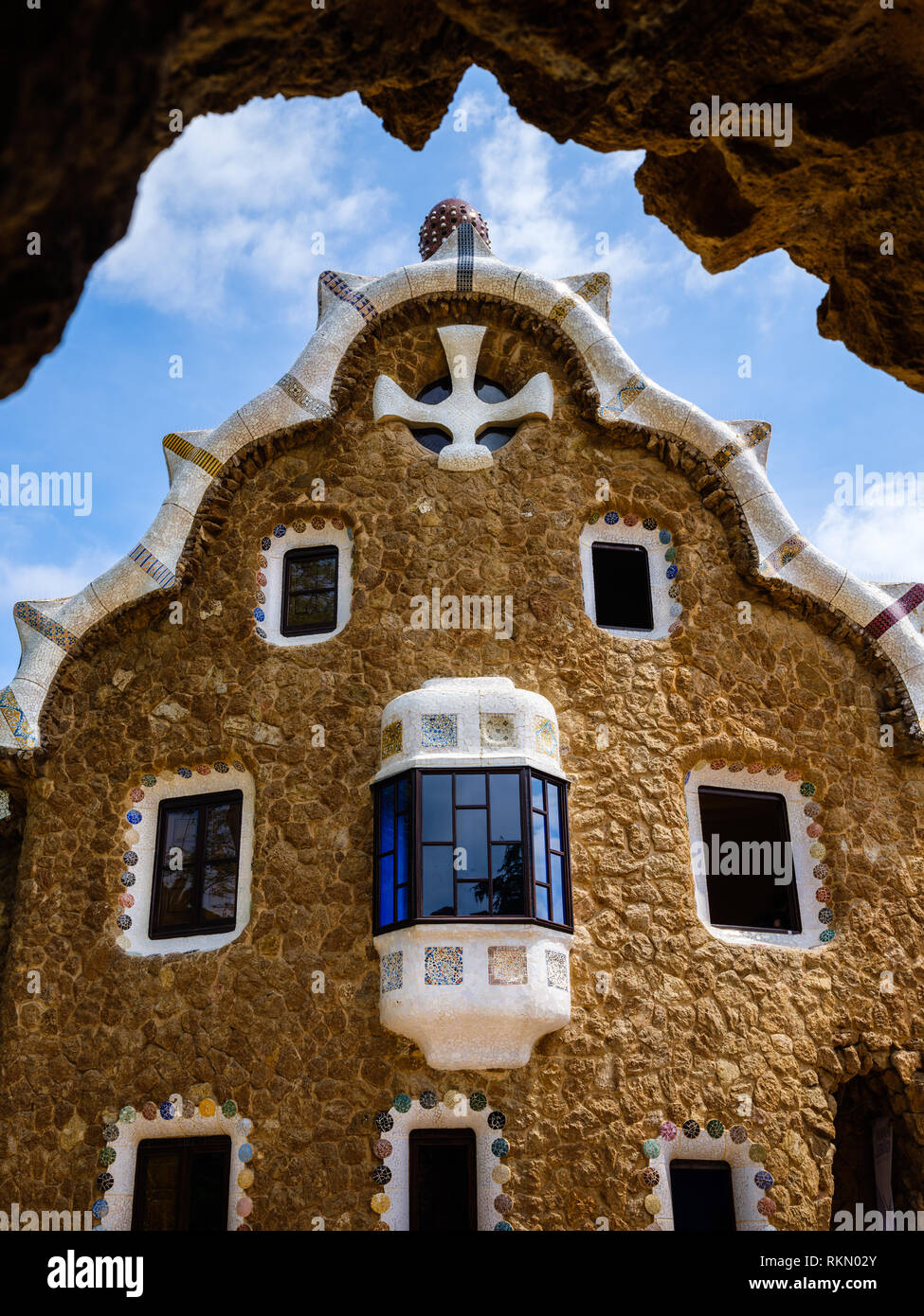 BARCELONA, SPAIN - CIRCA MAY 2018: Entrance pavilion of Parc Güel. Parque Güell is a public park system composed of gardens and architectonic elements Stock Photo