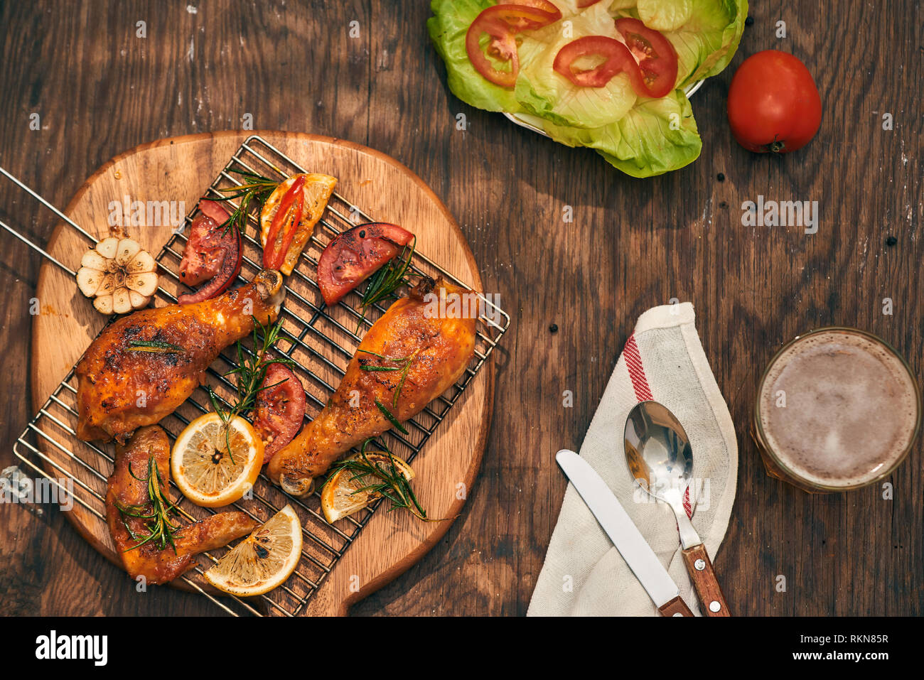 Grilled bbq chicken with fresh herbs and tomatoes Stock Photo Alamy
