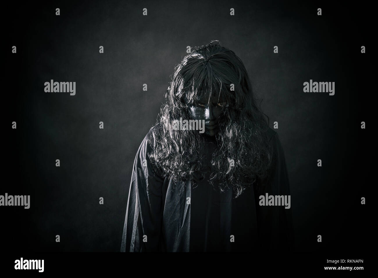Black cloak hi-res stock photography and images - Alamy