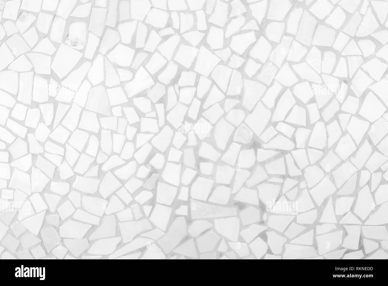 Broken tiles mosaic seamless pattern. White and Grey the tile wall high resolution real photo or brick seamless and texture interior background. Stock Photo