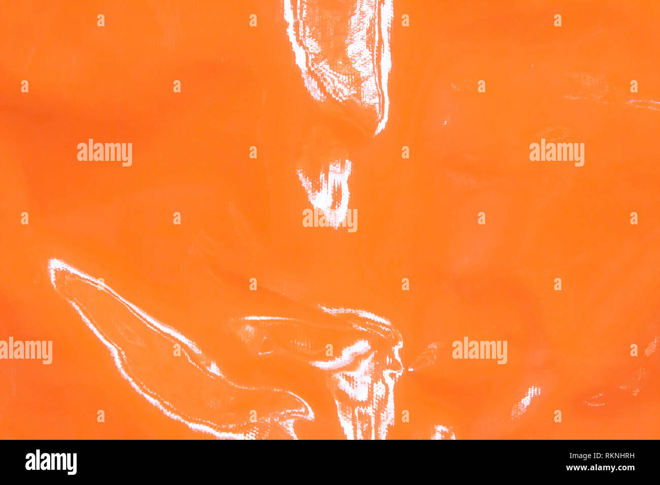 Wall surface plastic texture. Abstract background with orange shapes in top view. Stock Photo