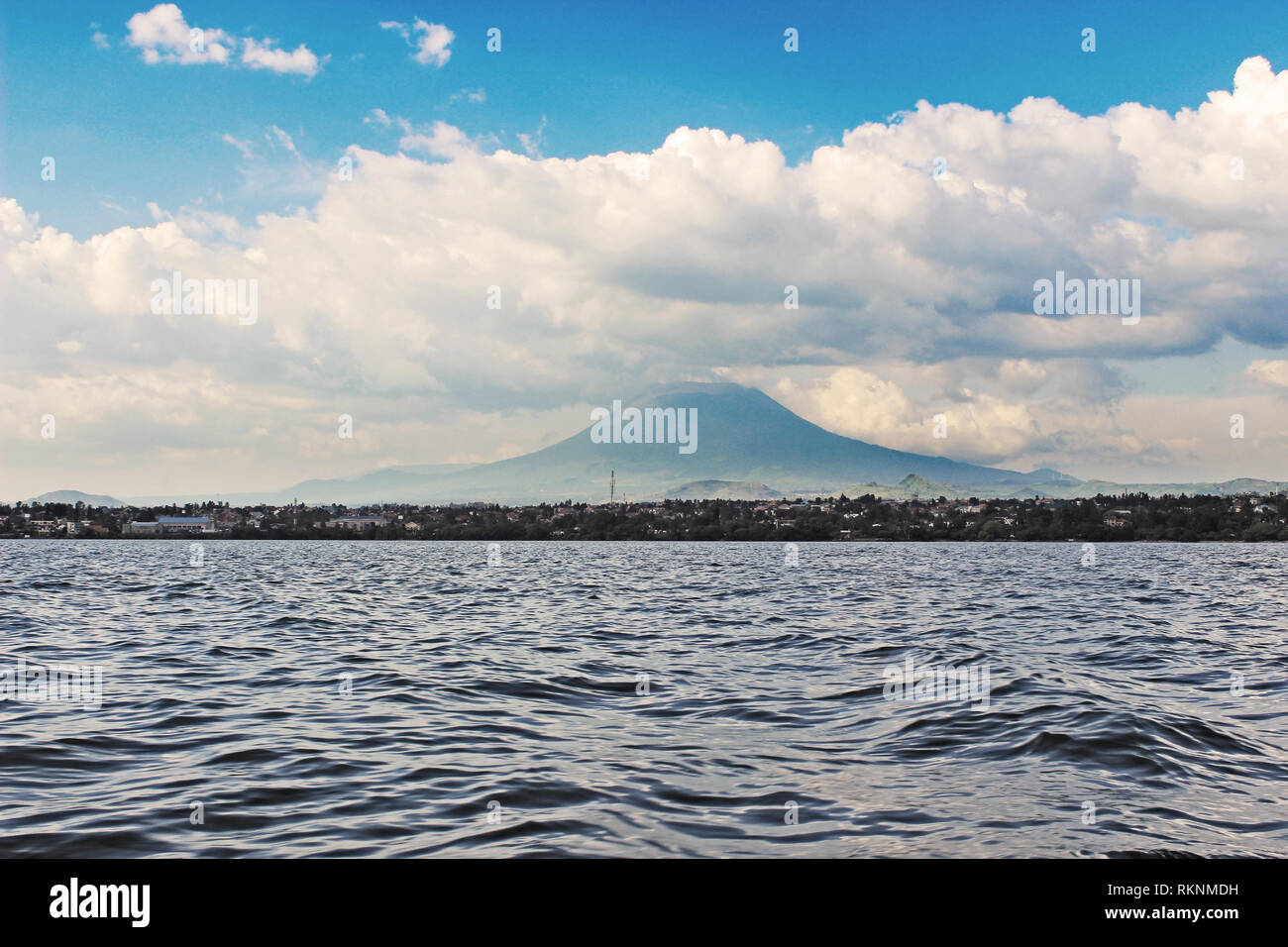Lake Kivu, Rwanda, with Mount Nyiragongo of DR Congo in the Background. Nice Weather for a Boat Ride. Stock Photo