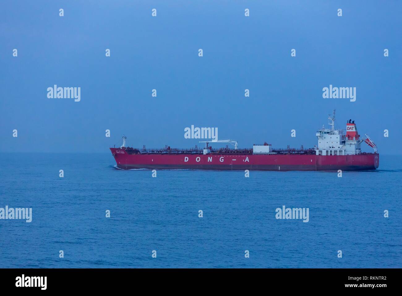 A cargo ship in the South China Sea near Japan. Stock Photo