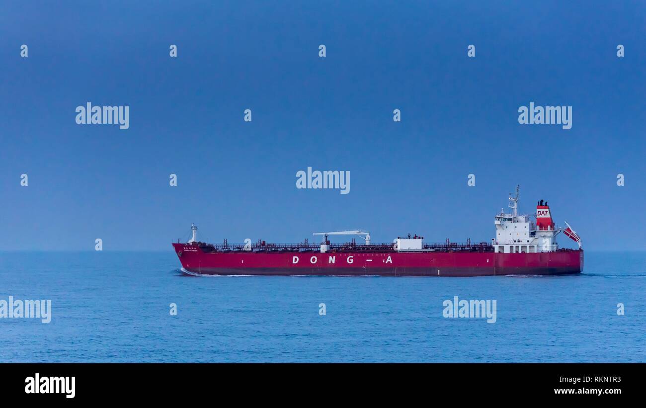 A cargo ship in the South China Sea near Japan. Stock Photo