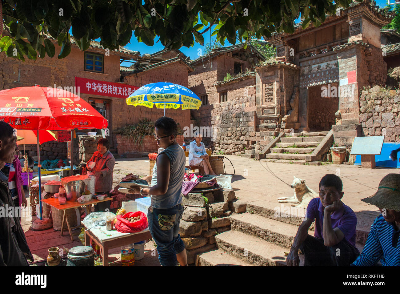 A market in the Nuodeng village square, called the 'thousand year old village', a former Tea Horse Trail town in Yunnan. Once wealthy Nuodeng, which w Stock Photo