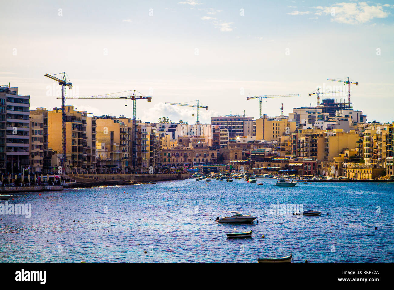 Construction on St. Julian's Bay in Malta on a sunny day Stock Photo
