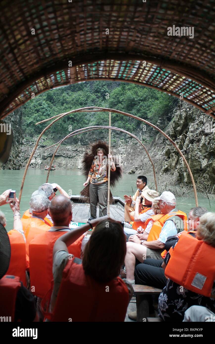 An American woman dresses up as a Chinese hunter gatherer while on a ...