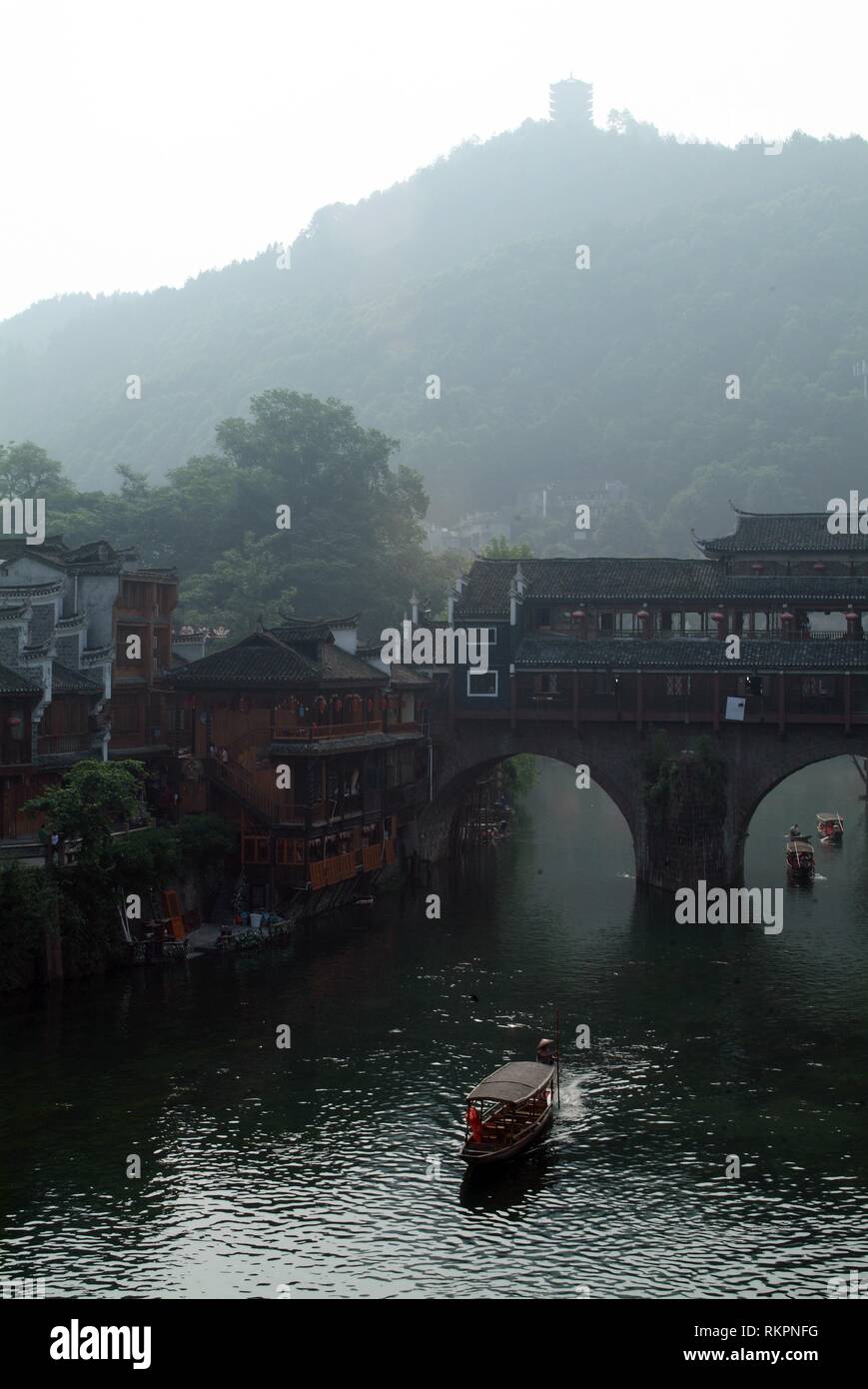 The Early Morning Mist Shrouding An Ancient Stone Bridge In Fenghuang Meaning Phoenix In Chinese Fenghuang Was Named After The Mythical Bird Of Im Stock Photo Alamy The Early Morning Mist Shrouding An Ancient Stone Bridge In Fenghuang Meaning Phoenix In Chinese Fenghuang Was Named After The Mythical Bird Of Im Stock Photo Alamy