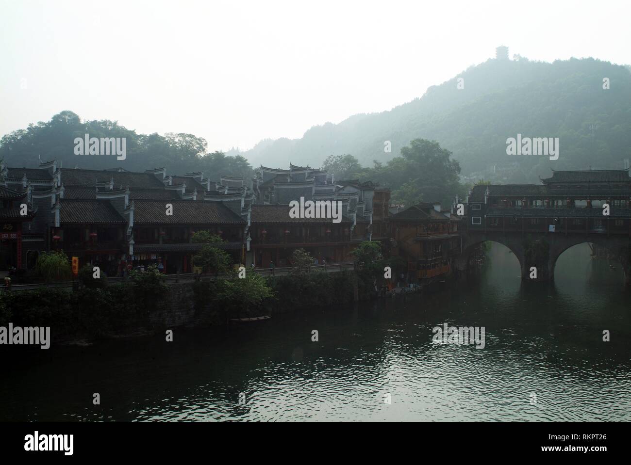 The Early Morning Mist Shrouding An Ancient Stone Bridge In Fenghuang Meaning Phoenix In Chinese Fenghuang Was Named After The Mythical Bird Of Im Stock Photo Alamy The Early Morning Mist Shrouding An Ancient Stone Bridge In Fenghuang Meaning Phoenix In Chinese Fenghuang Was Named After The Mythical Bird Of Im Stock Photo Alamy