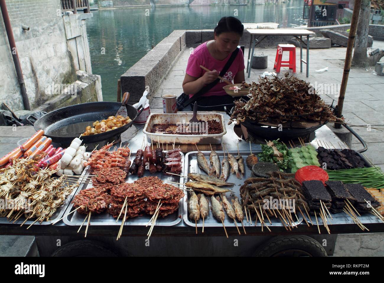 A barbecue vendor in Fenghuang. Stock Photo