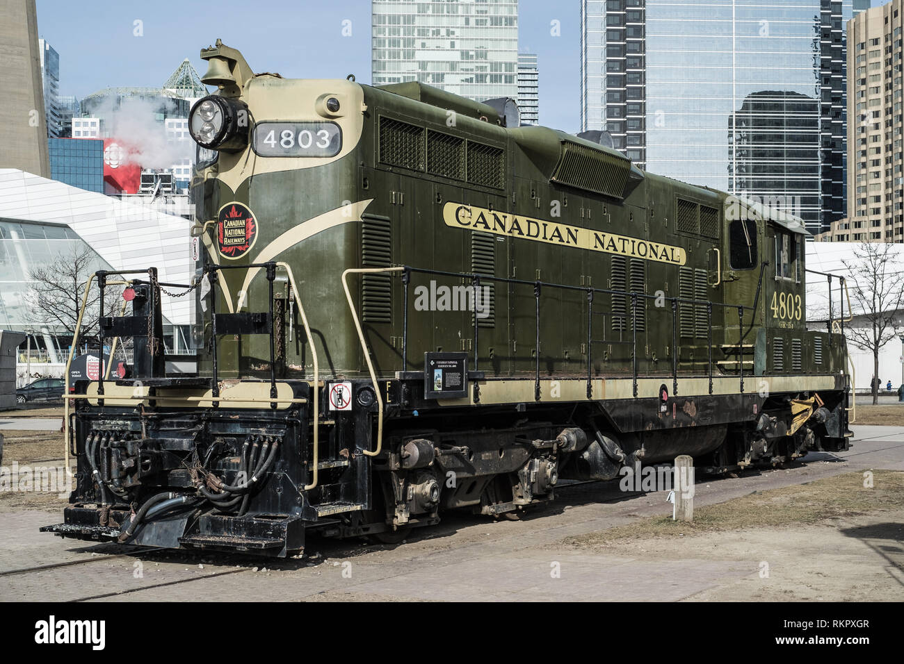 Toronto, Ontario, Canada - January 12 2019: Old locomotive at the Roundhouse Park (National Rail Museum) near the CN tower.  Touristic Attraction. Stock Photo