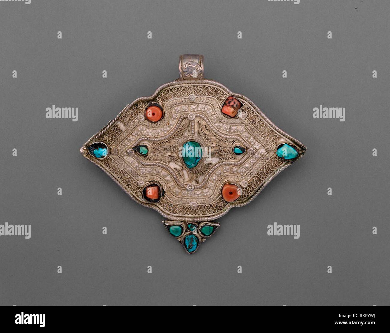 Silver Clasp - 18th century - Tibet - Origin: Tibet, Date: 1701-1800, Medium: Silver, coral, turquoise, Dimensions: 11 x 9.8 x 1.7 cm ( 4 5/16 x 3 Stock Photo