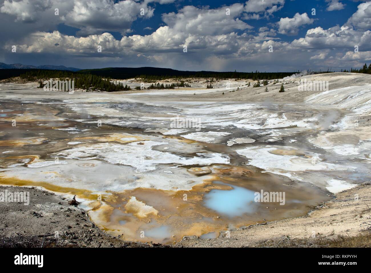 Alien like landscaped of Yellowstone with rusty and milky colors of thermal ponds and geysers Stock Photo