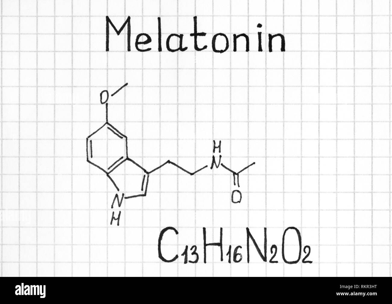 Chemical formula of Melatonin. Close-up. Stock Photo
