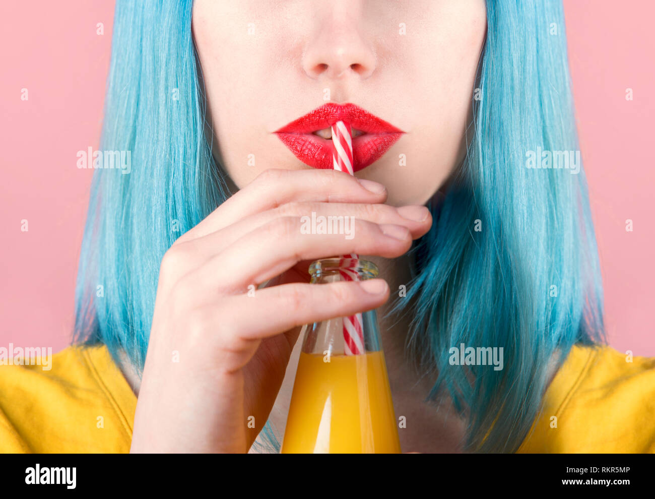 Closeup Studio Portrait Of Hipster Young Woman With Red Lipstick