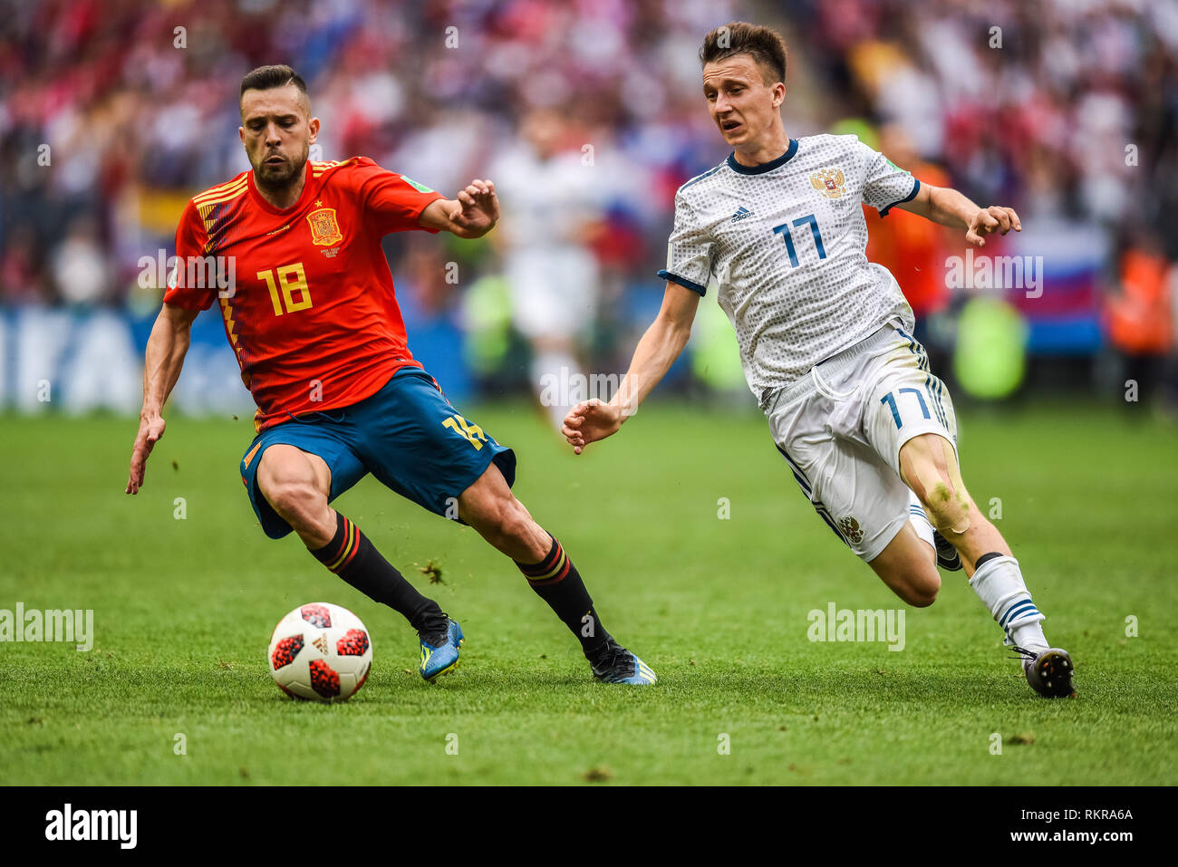 Moscow, Russia – July 1, 2018. Spain national football team midfielder Jordi Alba and Russia national team midfielder Aleksandr Golovin during FIFA Wo Stock Photo