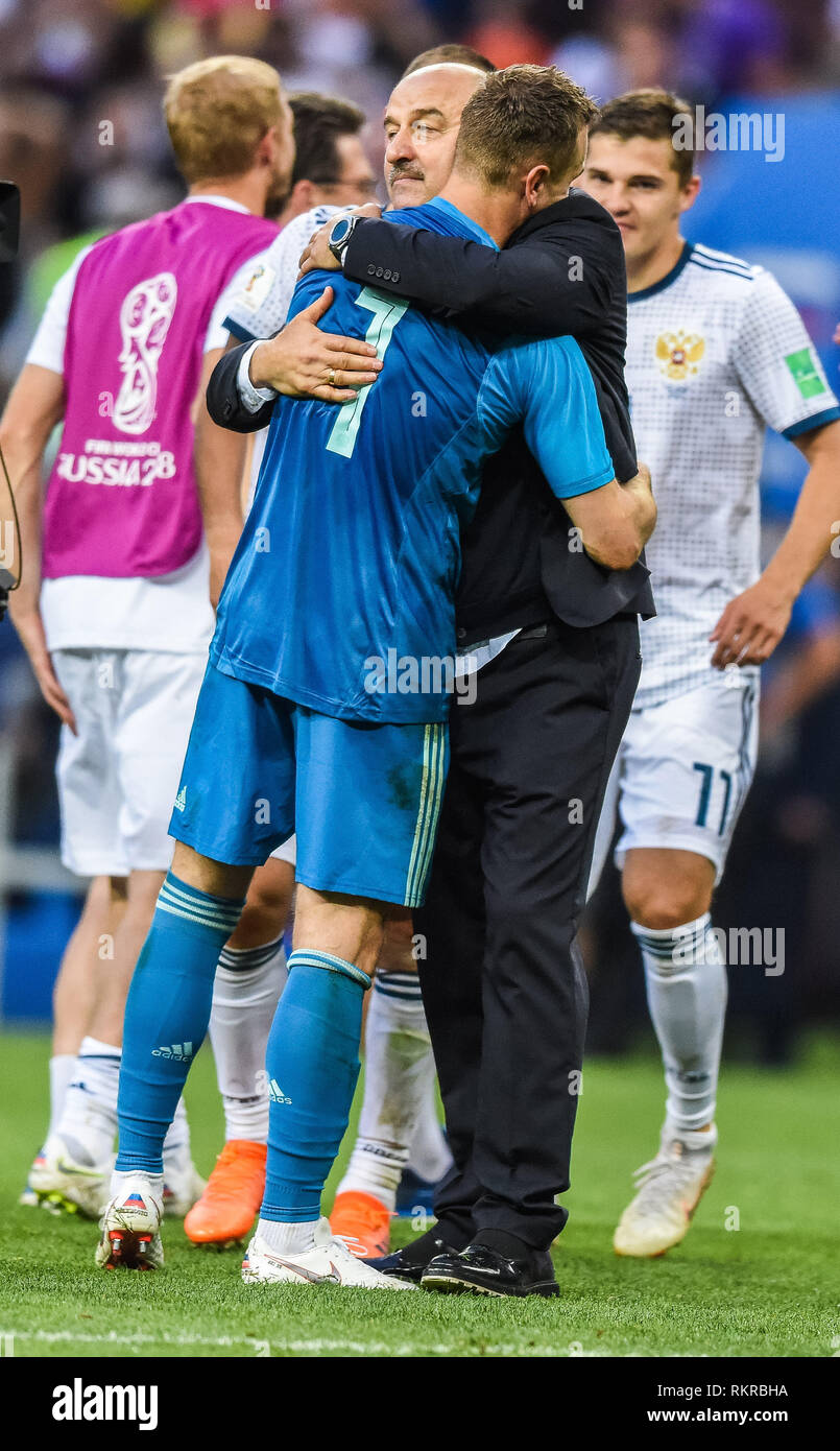 Moscow, Russia - July 1, 2018. Russia national team coach Stanislav Cherchesov with goalkeeper Igor Akinfeev after penalty shootout in FIFA World Cup  Stock Photo