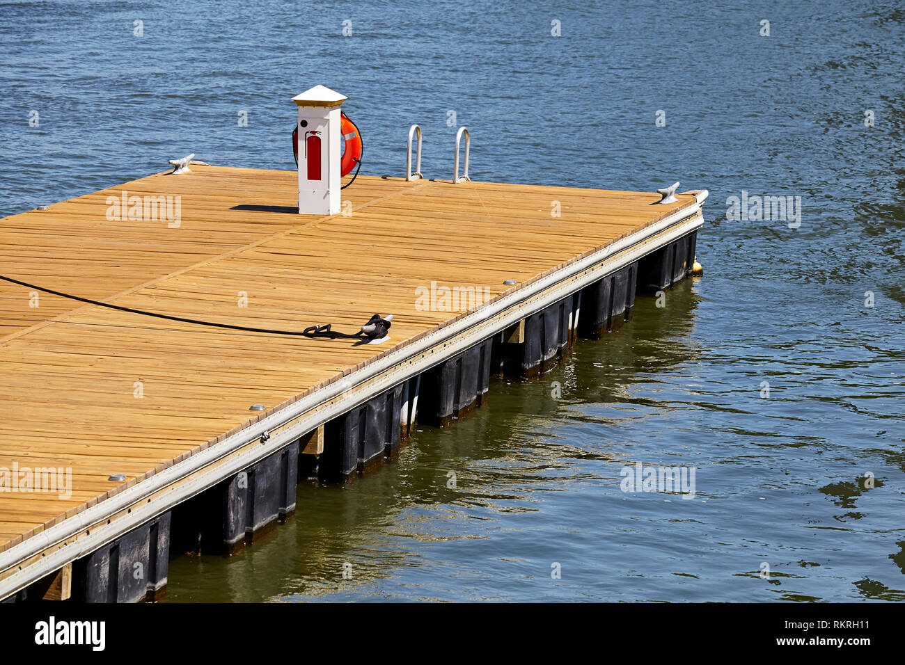 Floating landing platform for sailboats, yachts and small ships Stock